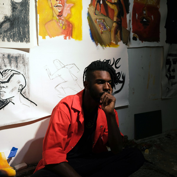 artist-in-front-of-work